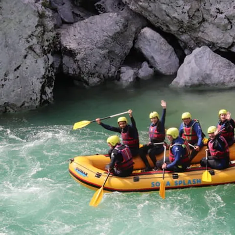 Paddles raised on a raft in the river gorge
