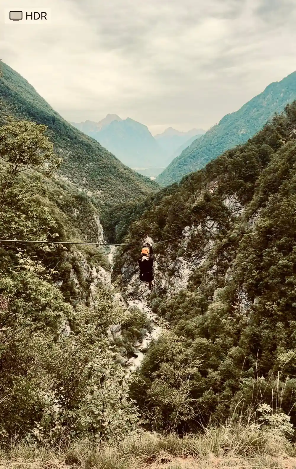 A rider deep in the cut of the canyon