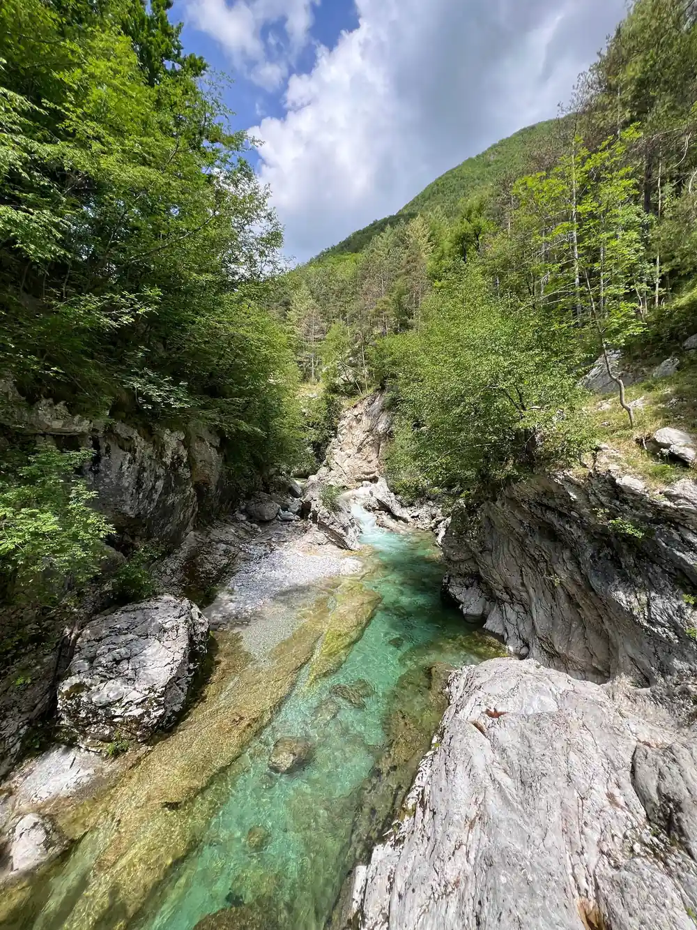 The river turning between rock walls